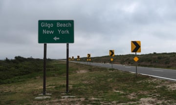 A sign pointing to Gilgo Beach stands posted along the Ocean Parkway in Babylon, New York, U.S., July 18, 2023. REUTERS/Shannon Stapleton