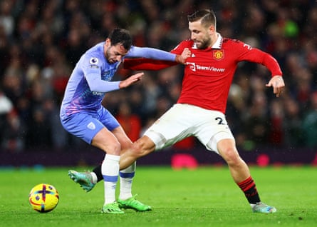 Luke Shaw gets a leg up against Bournemouth's Adam Smith