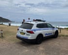 Man dead and teenage boy feared missing after boat capsizes off northern Sydney beach