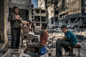 June 2014: Homeless children play in the ruins of Homs after opposition forces fled their district.