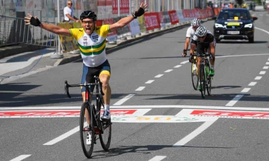 Roger Cull victoriously crosses the finish line at the World Masters Cycling Federation World Championship in St Johann Austria, in 2018.