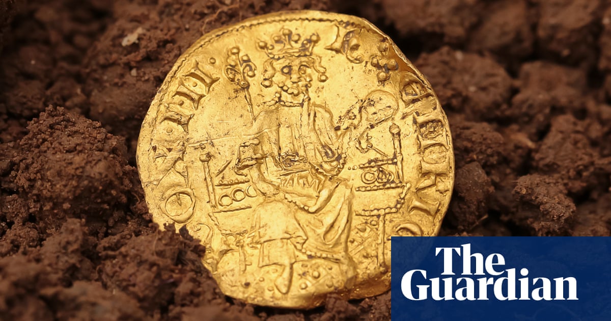 ‘I owe it to the kids’: coin found by detectorist dad sold for £648,000