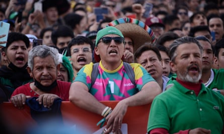 Football fans support the Mexican team in their match against Saudi Arabia on Wednesday.