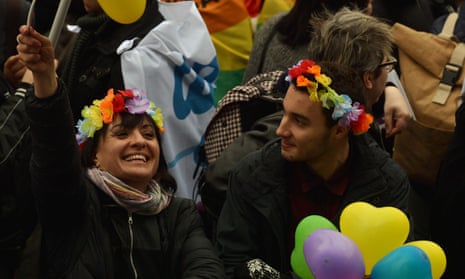 Supporters of LGBT associations take part in a protest, in central Rome on 5 March 2016, against the bill on civil union which was approved recently by the Italian Senate. / AFP / TIZIANA FABITIZIANA FABI/AFP/Getty Images