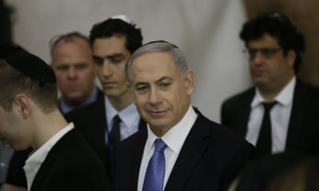Netanyahu visits the Western Wall after his election victory. Barack Obama would call Netanyahu to congratulate him ‘in the coming days’, the White House said.