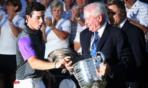 Rory McIlroy catches trophy