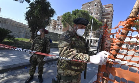 Italian soldiers secure a red zone in Mondragone, near Naples, where new 49 cases of coronavirus infections were confirmed.