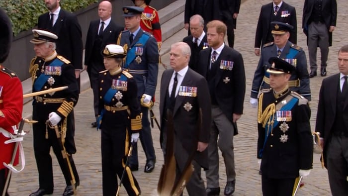 King Charles, Princess Anne, Prince Andrew, Prince Edward, Prince William, Prince Harry and Peter Phillips take part in the procession behind the Queen’s coffin.