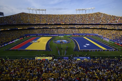 Curaçao, right, and Ecuador flags are displayed before the World Cup Group E soccer match between Ecuador and Curacao in Kansas City