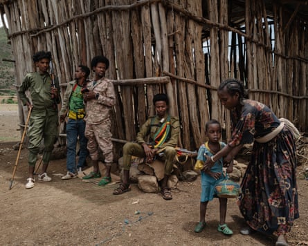 People including children at checkpoint