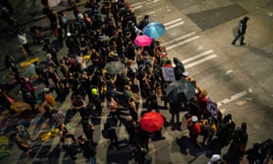 Demonstrators fill an intersection near the Seattle police east precinct in Washington on 26 July.