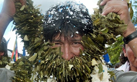 Morales, then president-elect, takes off a garland of coca leaves during a rally in Eterazama, in his home province of Chapare in 2005.