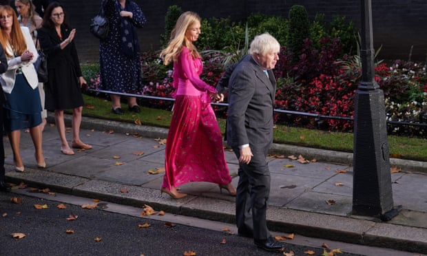 Boris Johnson and his wife Carrie Johnson leave 10 Downing Street, London.