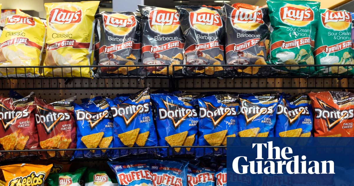 An aisle of potato chips, carefully arranged by flavor and approximate probability of gastrointestinal ruin.