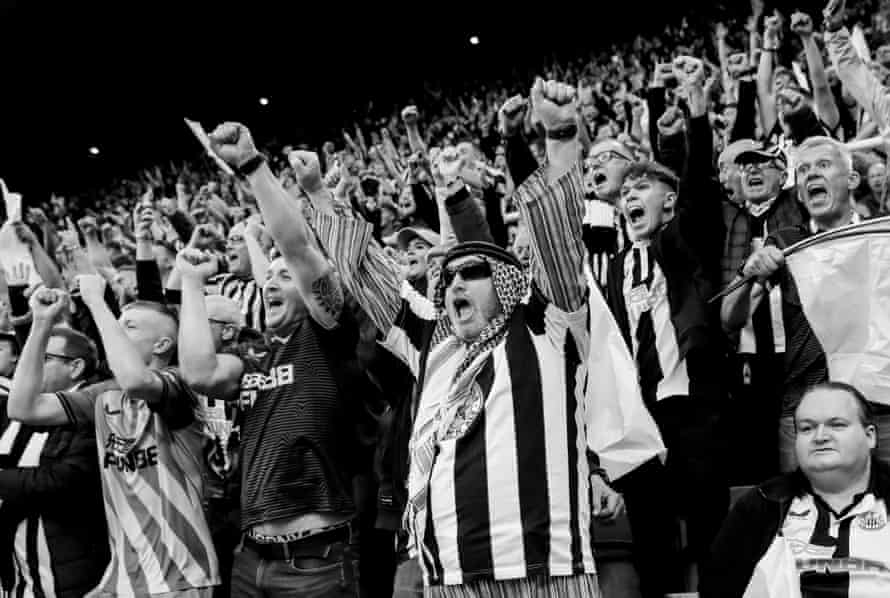 Newcastle fans in the Gallowgate End as the team scores during the Premier League match between Newcastle United and Tottenham Hotspur at St James Park on October 17th 2021.