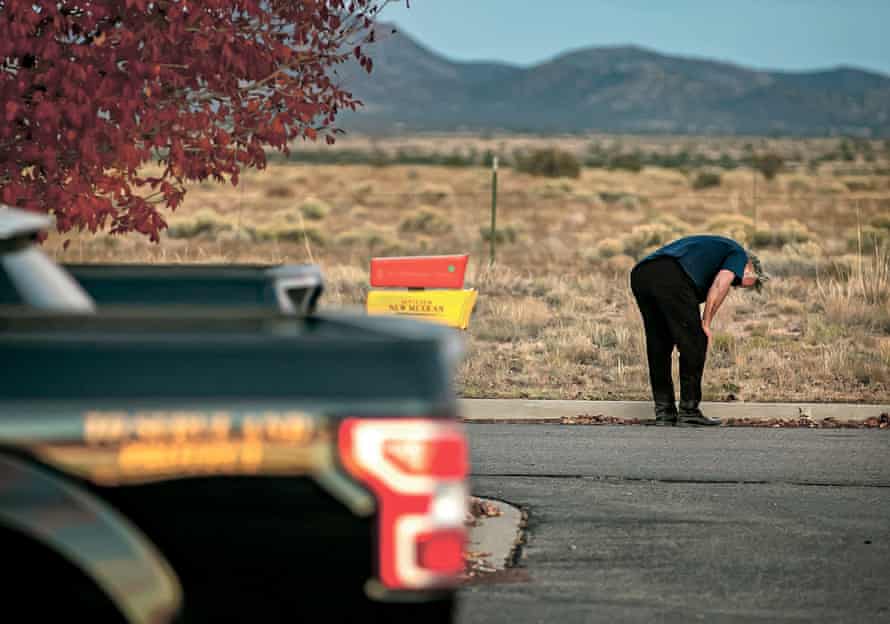 A distraught Alec Baldwin lingers in the parking lot outside the Santa Fe County Sheriff’s offices on Camino Justicia after being questioned on Oct. 20, 2021 about a shooting when a prop gun misfired earlier in the day on a local movie set.