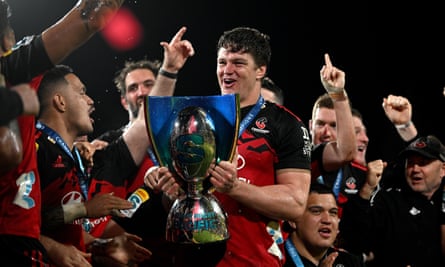 Scott Barrett holds the Super Rugby trophy after Crusaders won last year’s final.