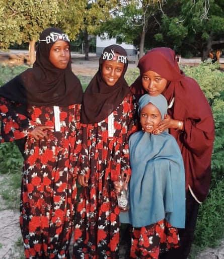 Hussein with her daughters.