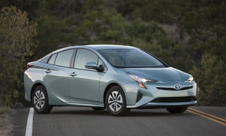 A 2016 Toyota Prius, a hybrid hatchback that charges a battery from an internal combustion engine.