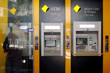 A man uses a Commonwealth Bank ATM
