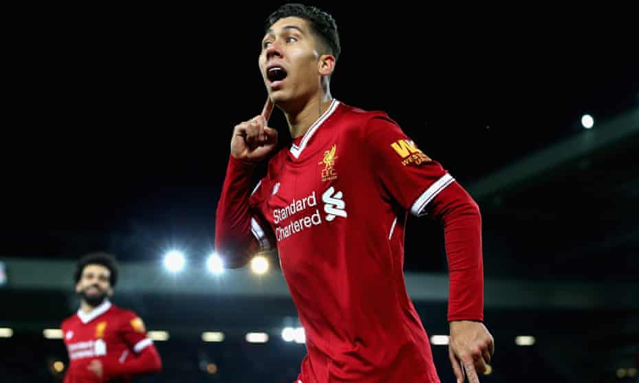 Roberto Firmino of Liverpool celebrates after scoring his sides second goal.