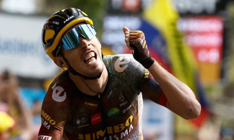 Christophe Laporte celebrates as he crosses the finish line to win stage 19.