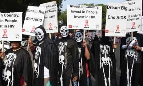 People Living with HIV AIDS (PLHA) carry placards during a protest demanding the revival of focus on India’s AIDS programme which has been on the decline in the past few years, in New Delhi on December 1, 2015, World AIDS Day. AFP PHOTO / SAJJAD HUSSAINSAJJAD HUSSAIN/AFP/Getty Images