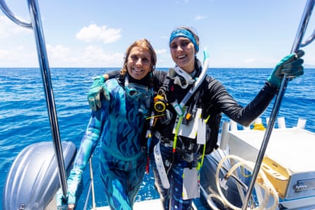 Jan Pope, and daughter, Sophie Kalkowski-Pope, surveying reefs from their family vessel as part of the Great Reef Census.