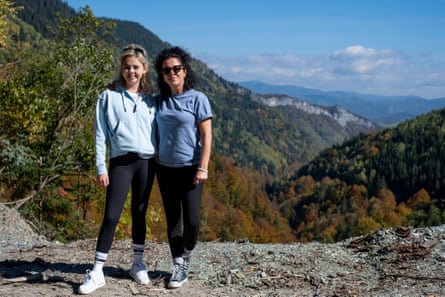 Jamie-Lee O’Donnell and Saoirse-Monica Jackson stand together with Romania’s rugged mountains in the background.