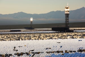 Two of the three solar towers and heliostats at Ivanpah solar thermal power plant