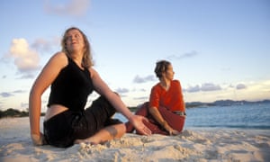 Writer Carole Cadwalladr pratising yoga with Diana Bourel (past-life therapist, inuitive healer, kinespiologist and yoga instructor) at the resort of Cap Juluca on the Caribbean island of Anguilla