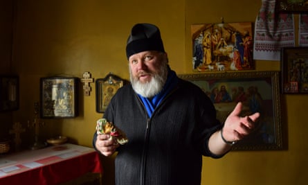 Georgy Petrosuk, bearded and wearing a hat