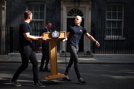 Staff from Downing Street bringing out the lecturn ahead of the PM’s statement.