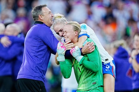 Alex Greenwood leaps connected nan backmost of Hannah Hampton, nan England goalkeeper, aft nan punishment shootout