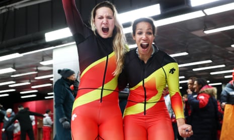 Mariama Jamanka and Lisa Buckwitz of Germany celebrate after winning the women’s bobsleigh.