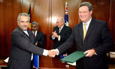 Timor-Leste’s Jose Ramos-Horta and Australia’s Alexander Downer shake hands after signing the Timor Sea treaty in January 2006