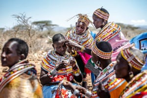 A group of women make traditional Samburu ornaments and jewellery out of beads at the Sera conservancy.