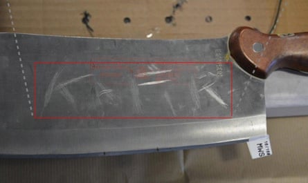 West Midlands Police handout of a cleaver that was found in Naweed Ali’s car, with the word kafir scratched on the blade.