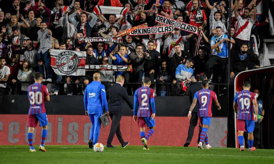 Rayo Vallecano supporters taunt Barcelona’s players and Ronald Koeman as they leave the pitch after the Dutchman’s team lost 1-0.