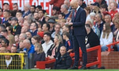 Erik ten Hag makes notes during Manchester United's 3-0 home defeat by Liverpool