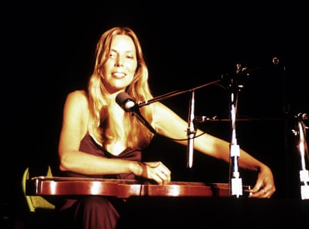 Joni Mitchell performing in Berkeley, California, in 1974.
