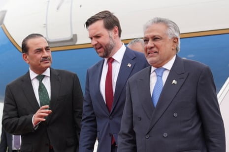 Pakistan's army chief Asim Munir in a suit walking with US vice-president JD Vance and Pakistani foreign minister Ishaq Dar.