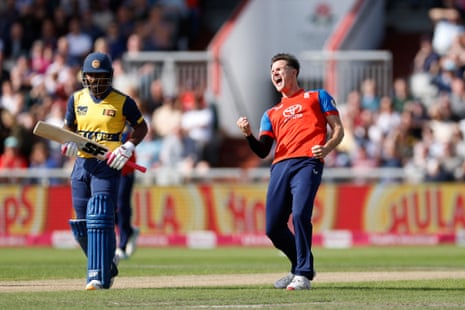Sonny Baker enjoys his wicket.