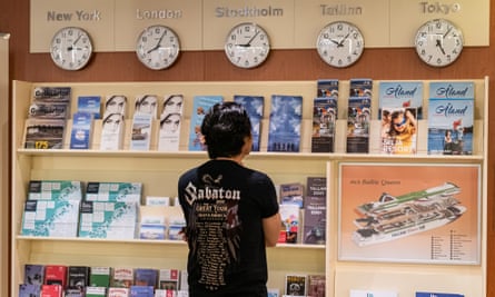 Where to next? A fan checks out the brochures on the Sabaton Cruise