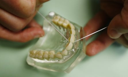 Do the benefits of flossing your teeth have scientific backing?