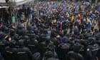 Georgia protests: riot police move in on demonstrations after ‘foreign agents’ bill passed into law – live