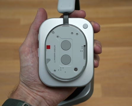 The Nothing Headphone 1 held in a hand showing the details on the outside of the ear cup.