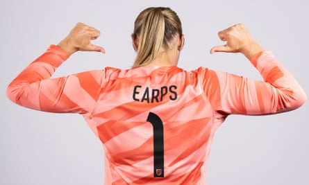 Mary Earps of England poses during the official FIFA Women’s World Cup Australia & New Zealand 2023 portrait session on July 18, 2023 in Brisbane, Australia, back to camera, wearing pink kit with her name on