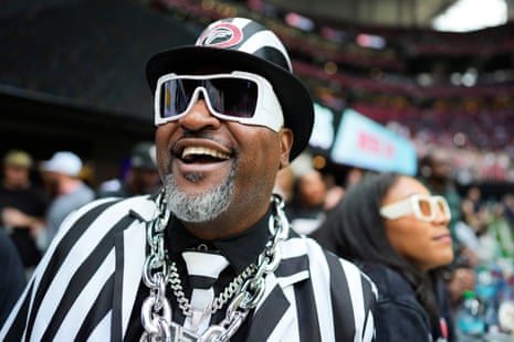 Atlanta Falcons fan Mike Hall is laughing as his team take out a massive lead over the Panthers