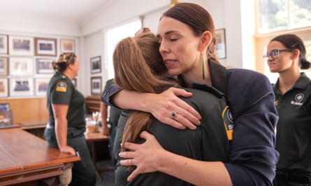 Jacinda Ardern comforted first responders in the aftermath of the volcano’s eruption.